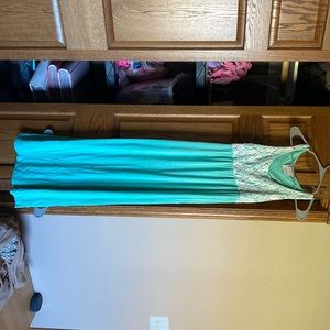 Coveted maxi dress with size small. Good condition.